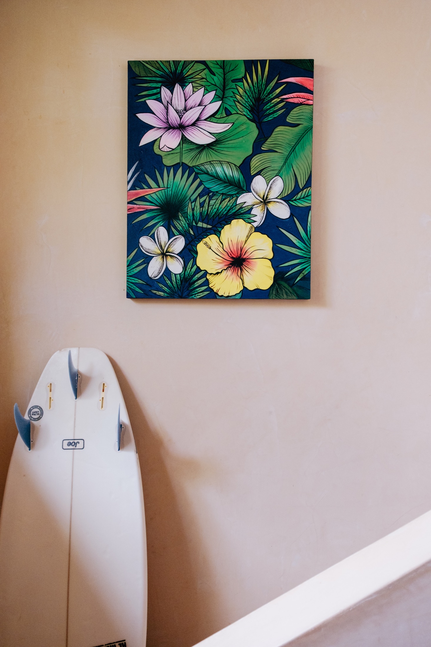 Surfboard ready for a morning surf near Casa Calma